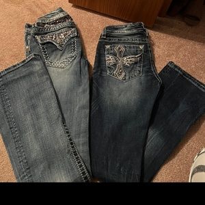 2 pairs of size 25 bootcut low rise. Like new